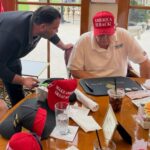 Trump Photo with Saddam-Era Dinar Sparks Speculation