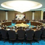 PM Defends Currency Devaluation Amid Economic Crisis